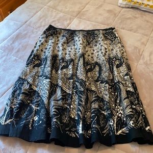 Vintage circle tail cotton dance skirt with sequin embellishment.